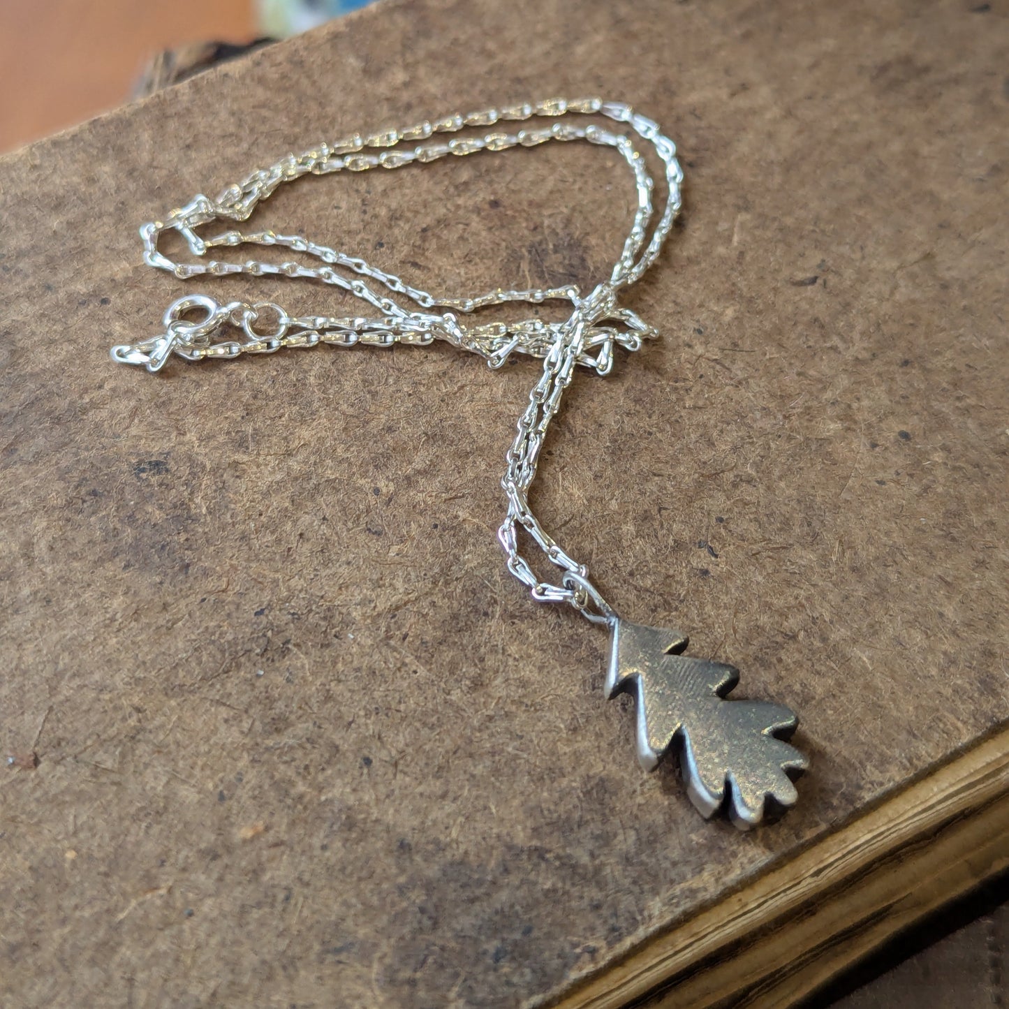 Hand carved oak leaf pendant
